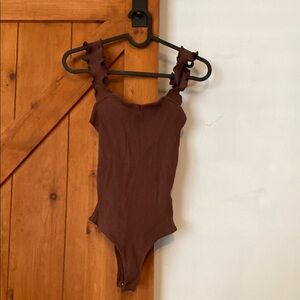 Brown Ribbed Bodysuit with High-Cut Leg